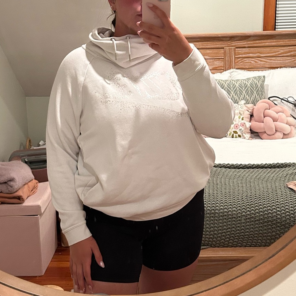 White Nike sweatshirt with silver logo